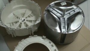 imagen de un tambor de lavadora desmontado