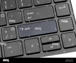 imagen de un teclado con una tecla de mayusculas resaltada
